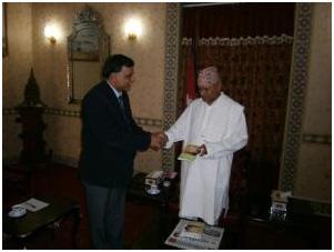 Pramod Aggarwal providing a copy of the Newsletter to His Excellency President of Nepal. Photo: C. Adhikari