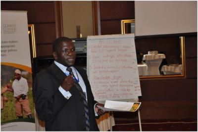  Dr. Charles Kajura the District Production and Marketing Officer for Hoima presenting policy and knowledge gaps for research. Photo: J. Recha 
