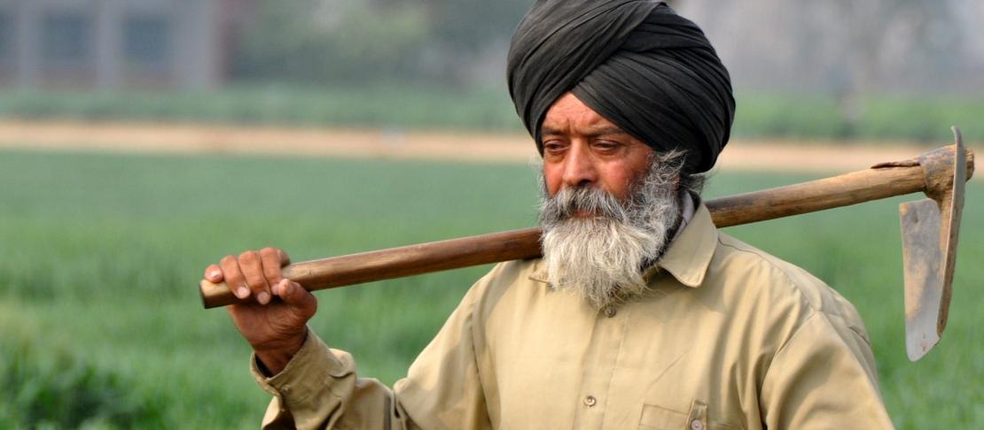 Farmer from the village of Ludhiana in Punjab India. Source: https://www.flickr.com/photos/cgiarclimate/5477626770/in/set-72157626137415218